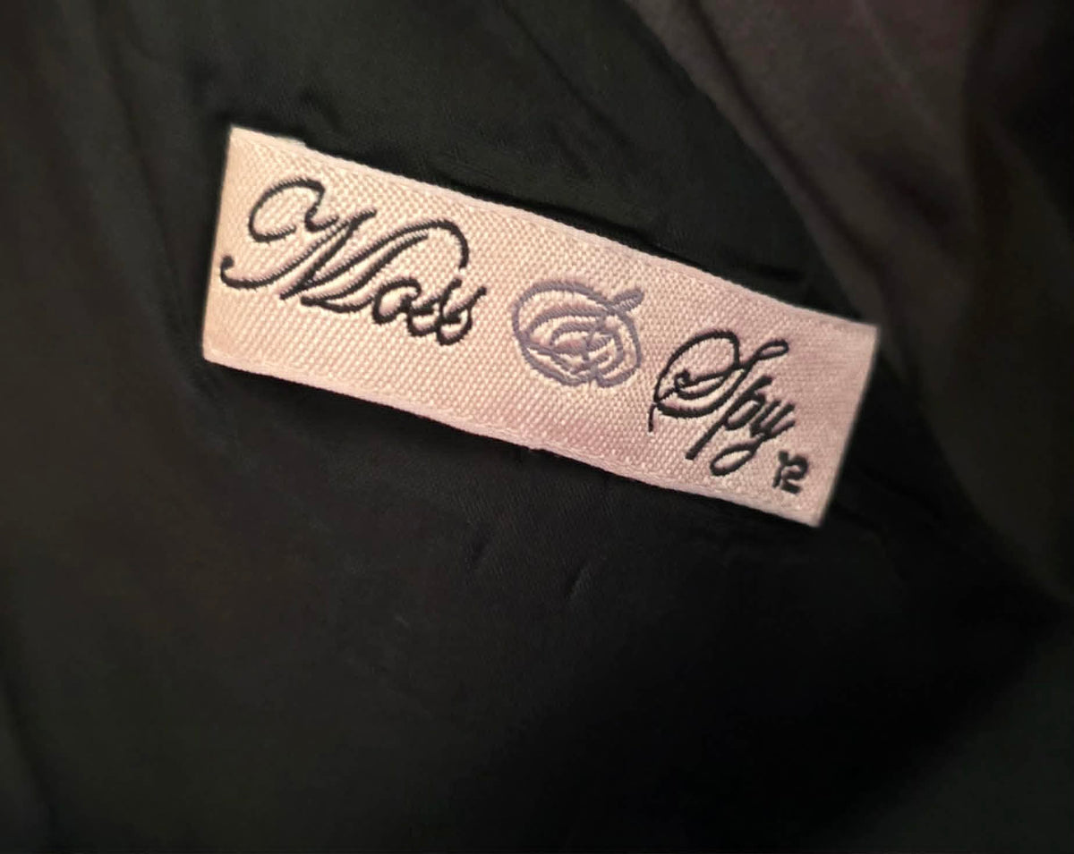 Moss & Spy brand label size 12