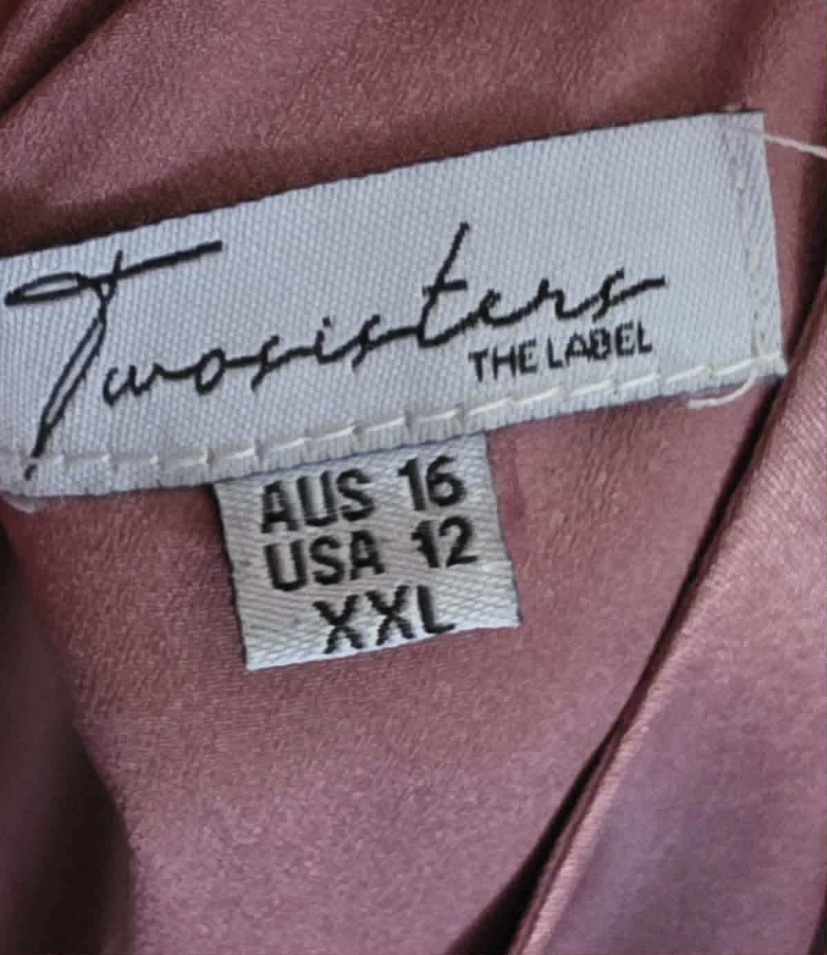 Two Sisters The Label brand label showing AUS 16 / USA 12 / XXL
